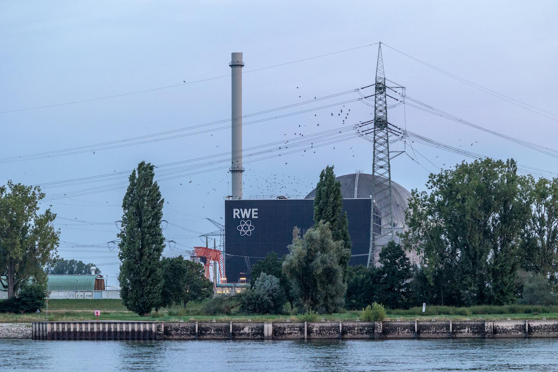 Twilight view of RWE nuclear power plant in Biblis, Hesse near the river.