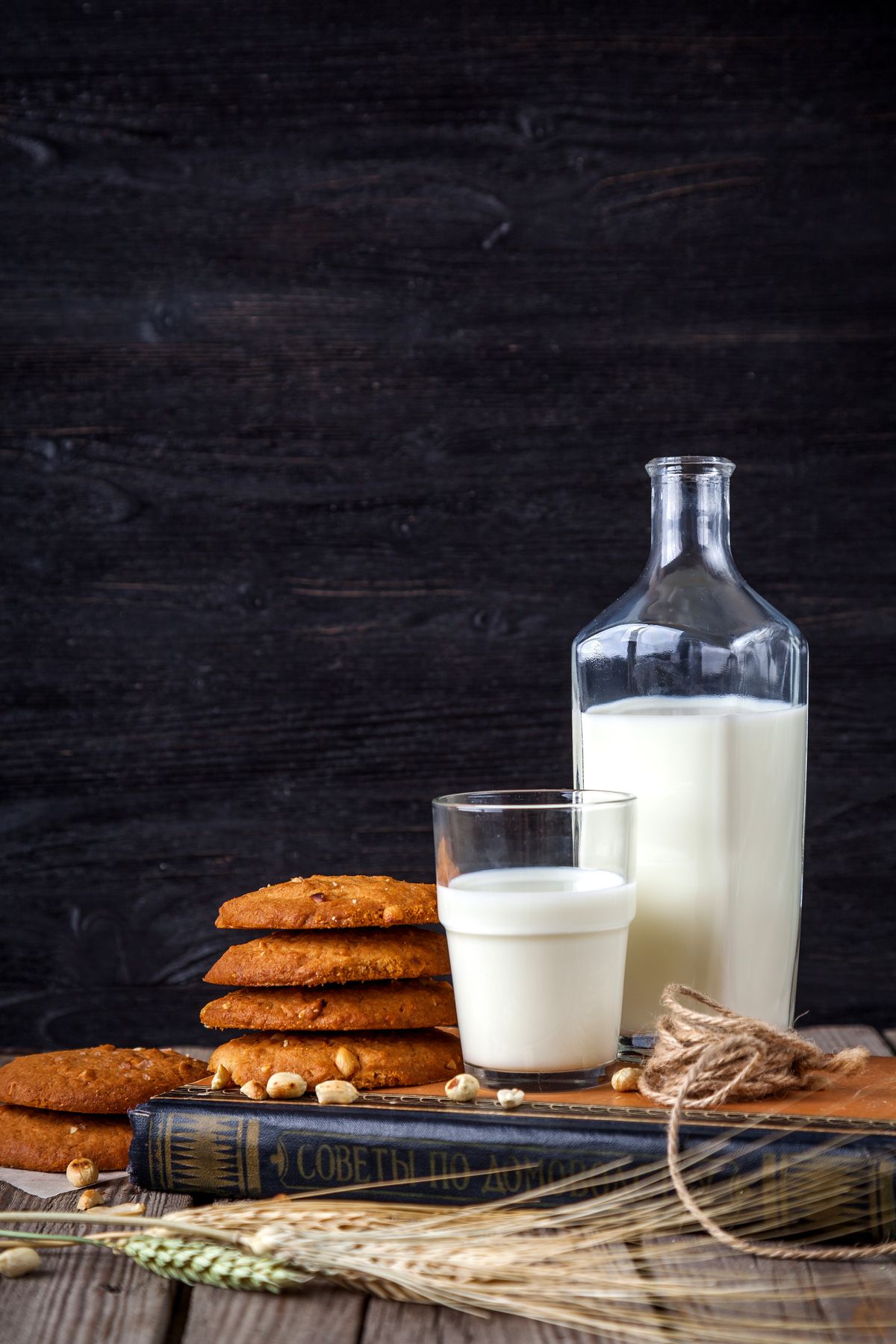 Milk bottle and cookies styled for a confectionery brand shoot
