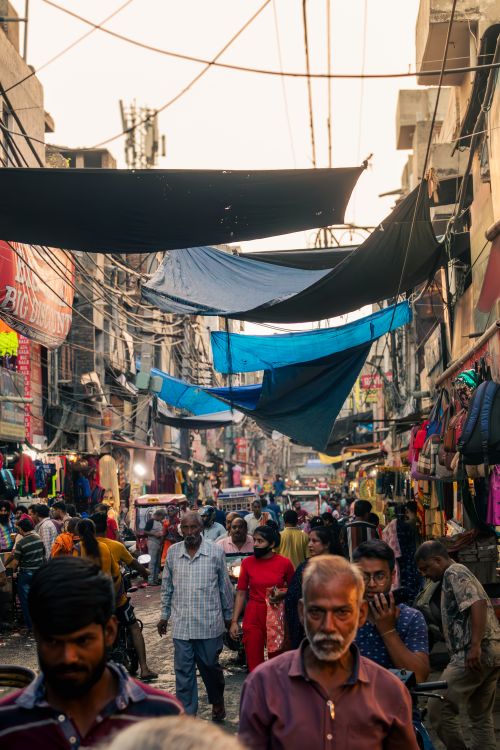 Free Dense crowds and vibrant market life captured in a Ludhiana street, India. Stock Photo