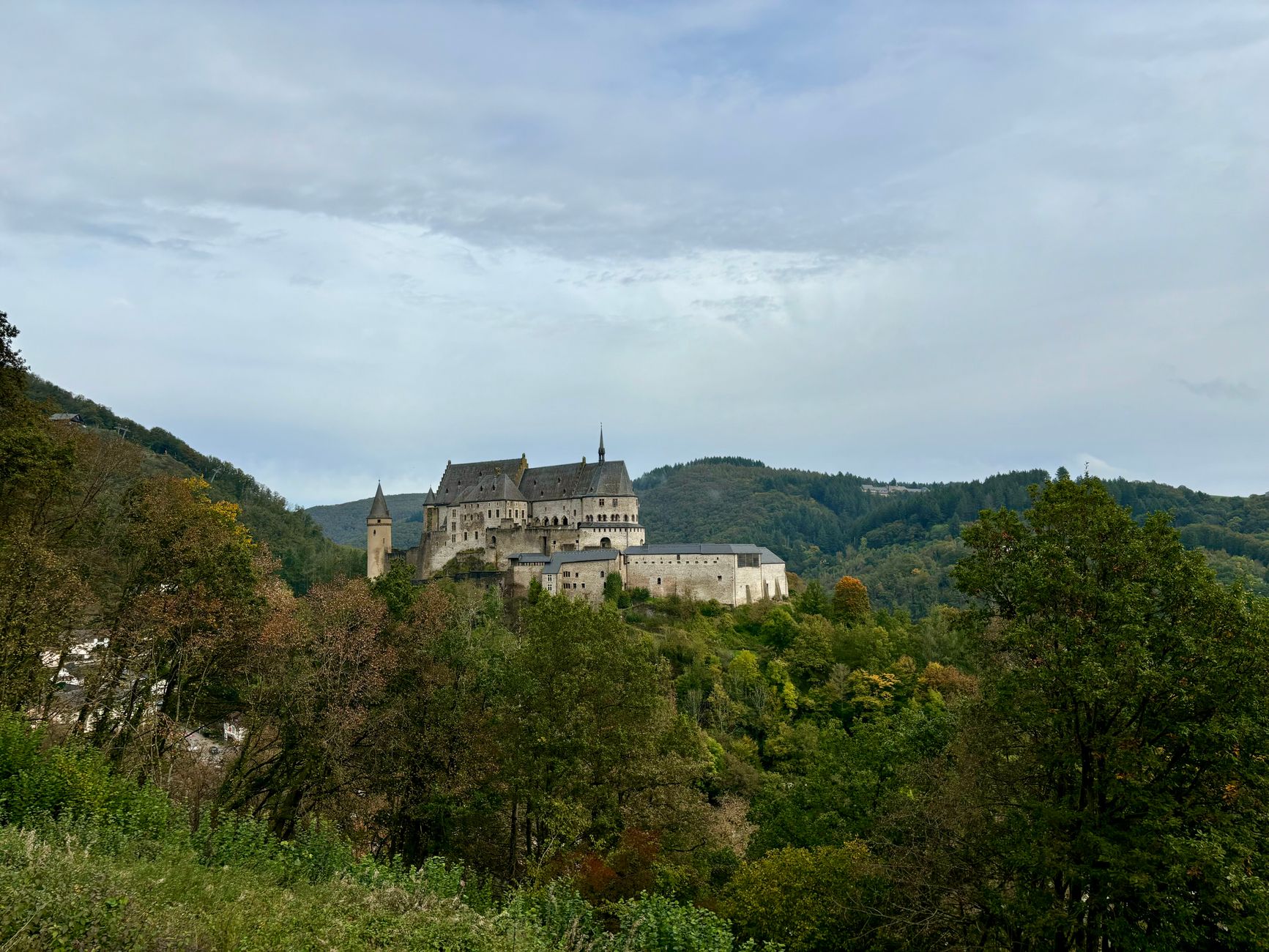 Stone castle hotel with turrets in the Luxembourg Ardennes