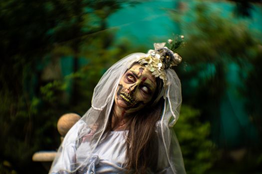 A haunting figure in skeleton makeup and attire, outdoors in Mexico City.