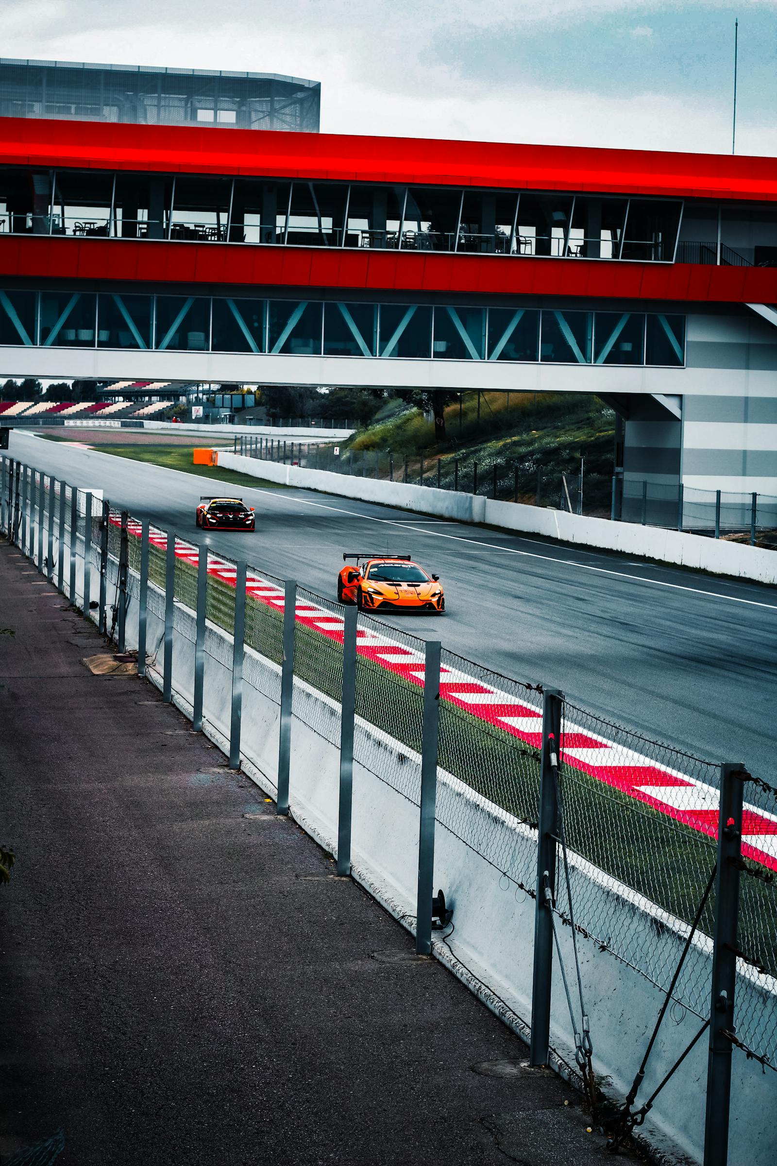 High-speed action on a professional race track · Free Stock Photo