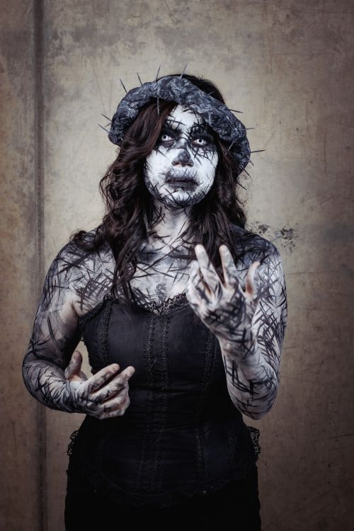 Free Gothic woman with intricate makeup and costume, evoking mystery and artistry. Stock Photo