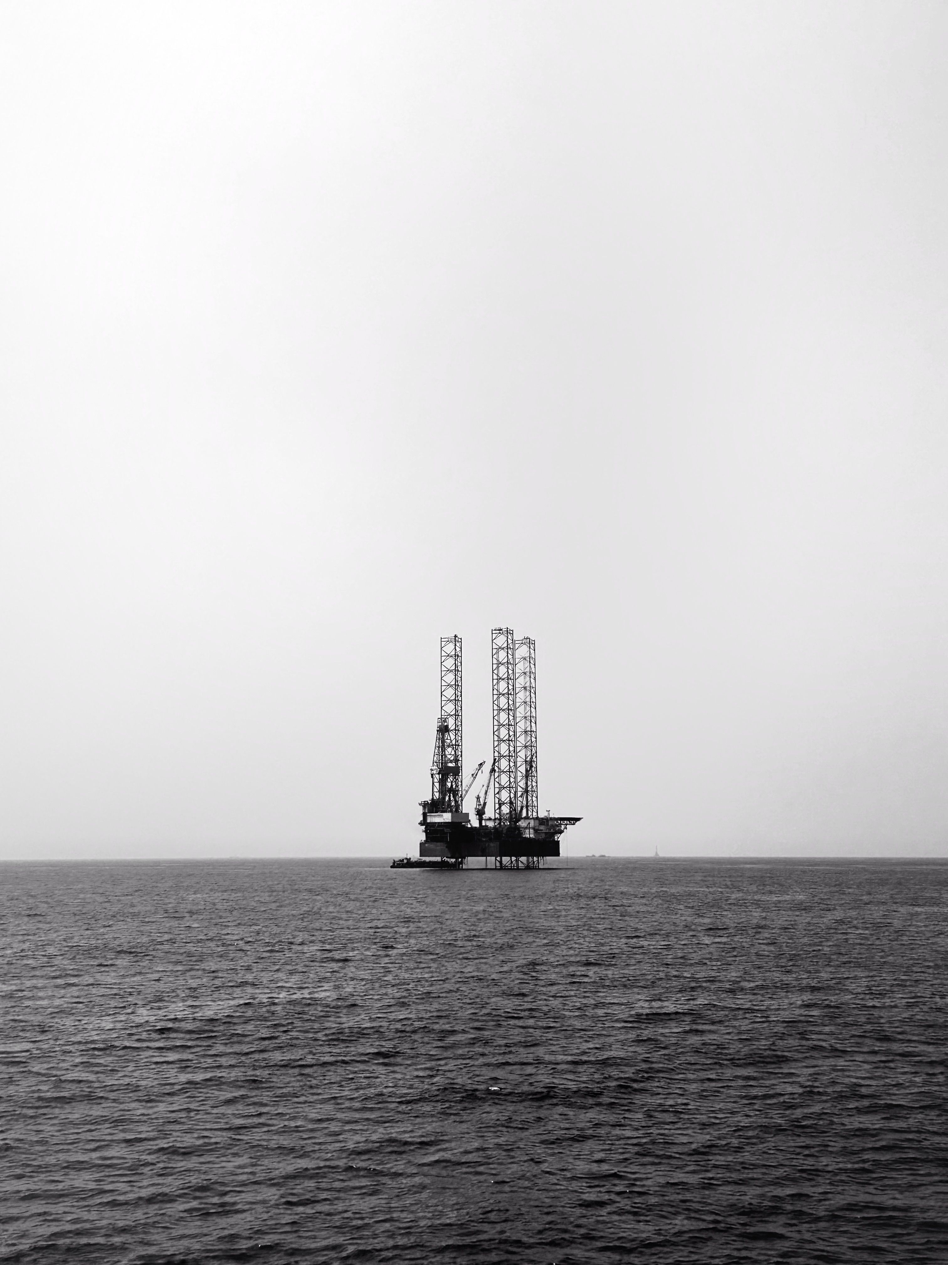 Dramatic Black and White Offshore Oil Rig · Free Stock Photo