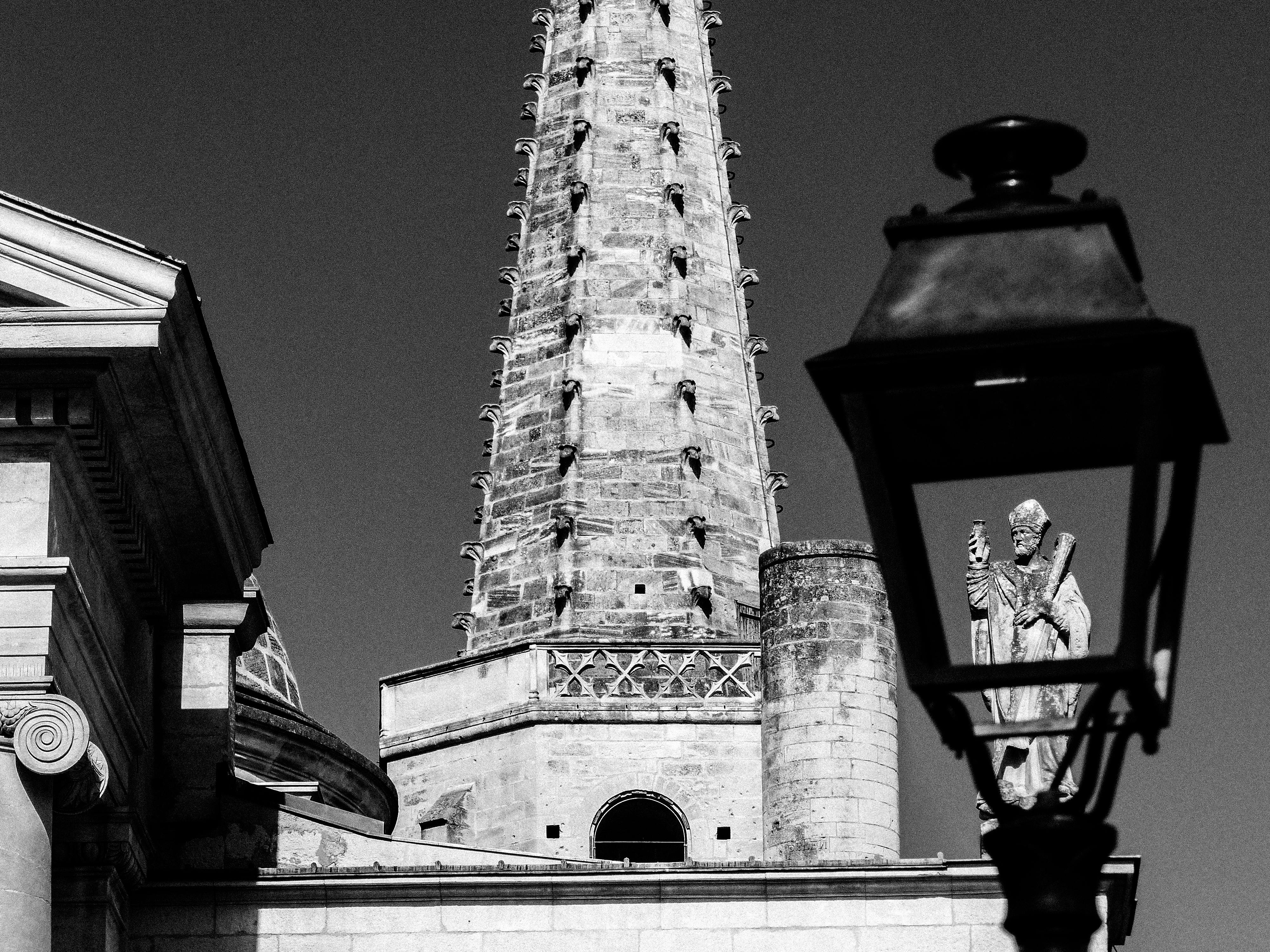 black and white cathedral architecture and statue