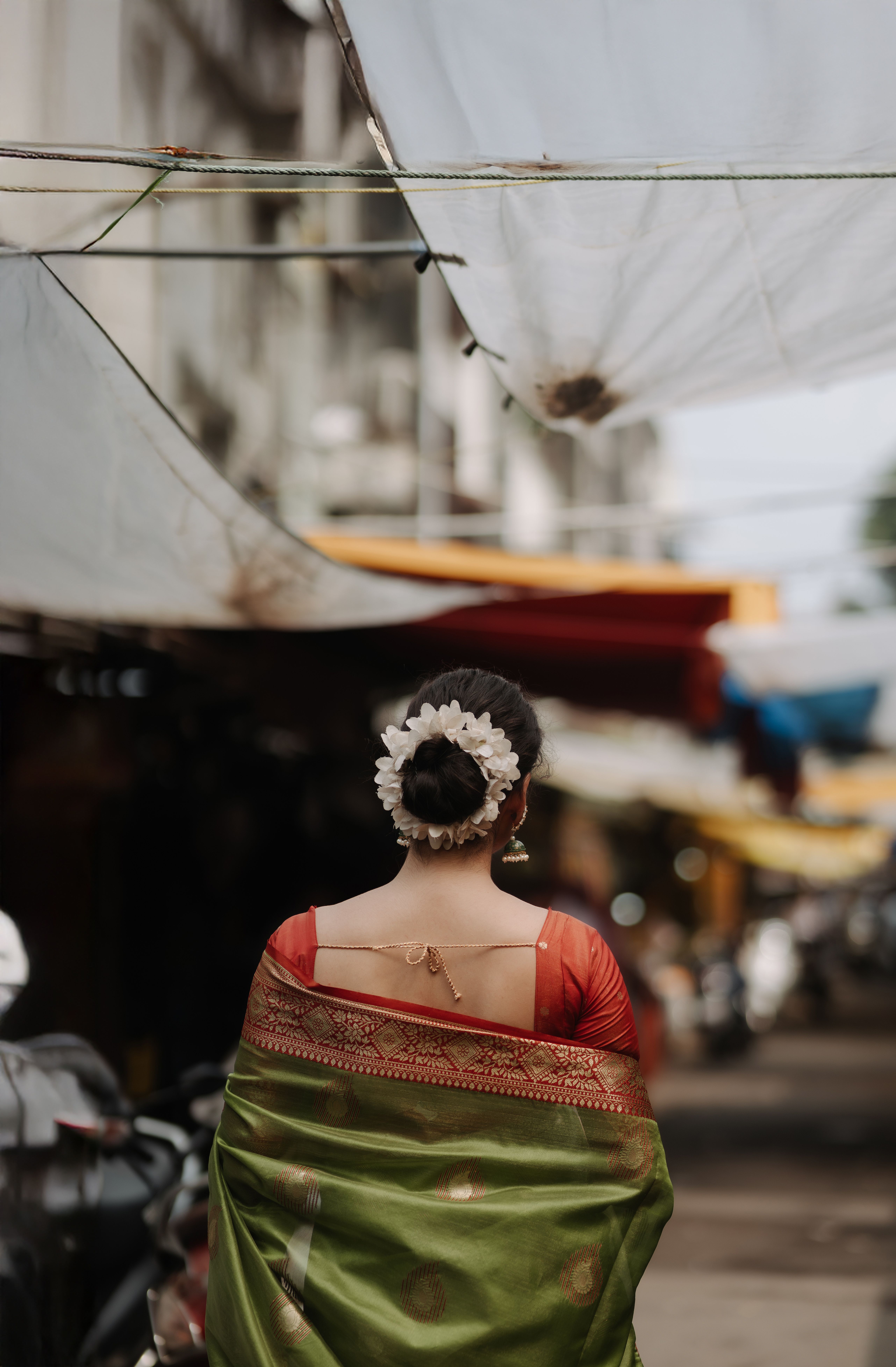 Traditional Indian Woman in Green Saree Outdoors · Free Stock Photo