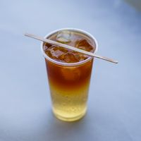 Chilled amber soda over ice, photo by Kunal Lakhotia on Pexels