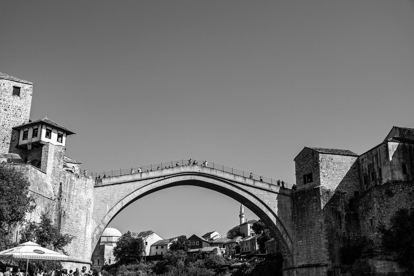 Black and white photo of the historic Stari Most bridge in Mostar, Bosnia and Herzegovina