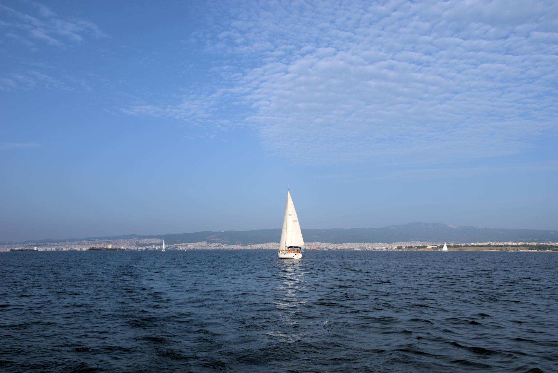 Sailboat heading to Thessaloniki harbor