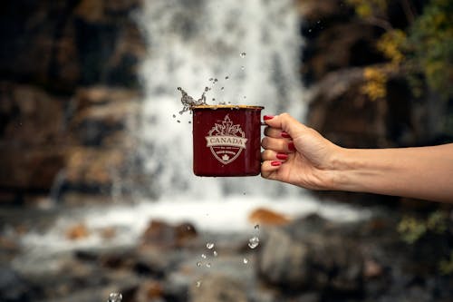 Free Person Holding Red Mug Stock Photo