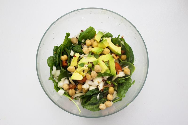 chickpeas layered in a mason jar salad