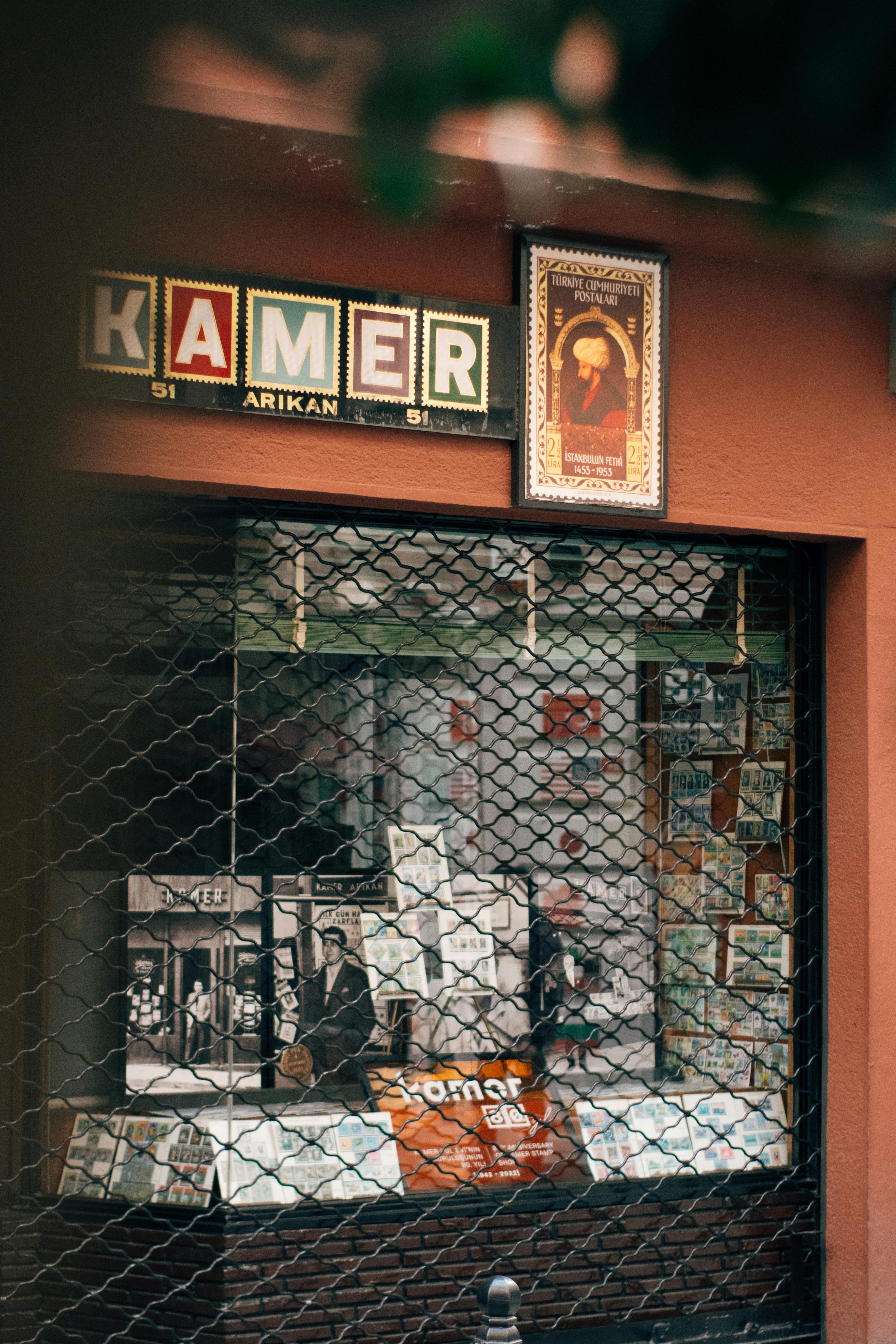 Vintage Shopfront with Grid Display and Posters