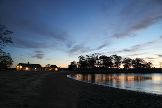 Peaceful sunrise view at Cove Island Park, Stamford with reflections on the water.