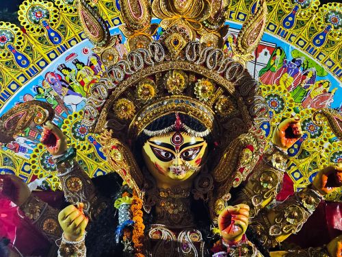 Free Intricate and colorful idol of goddess Durga with vibrant decorations, highlighting cultural festival. Stock Photo