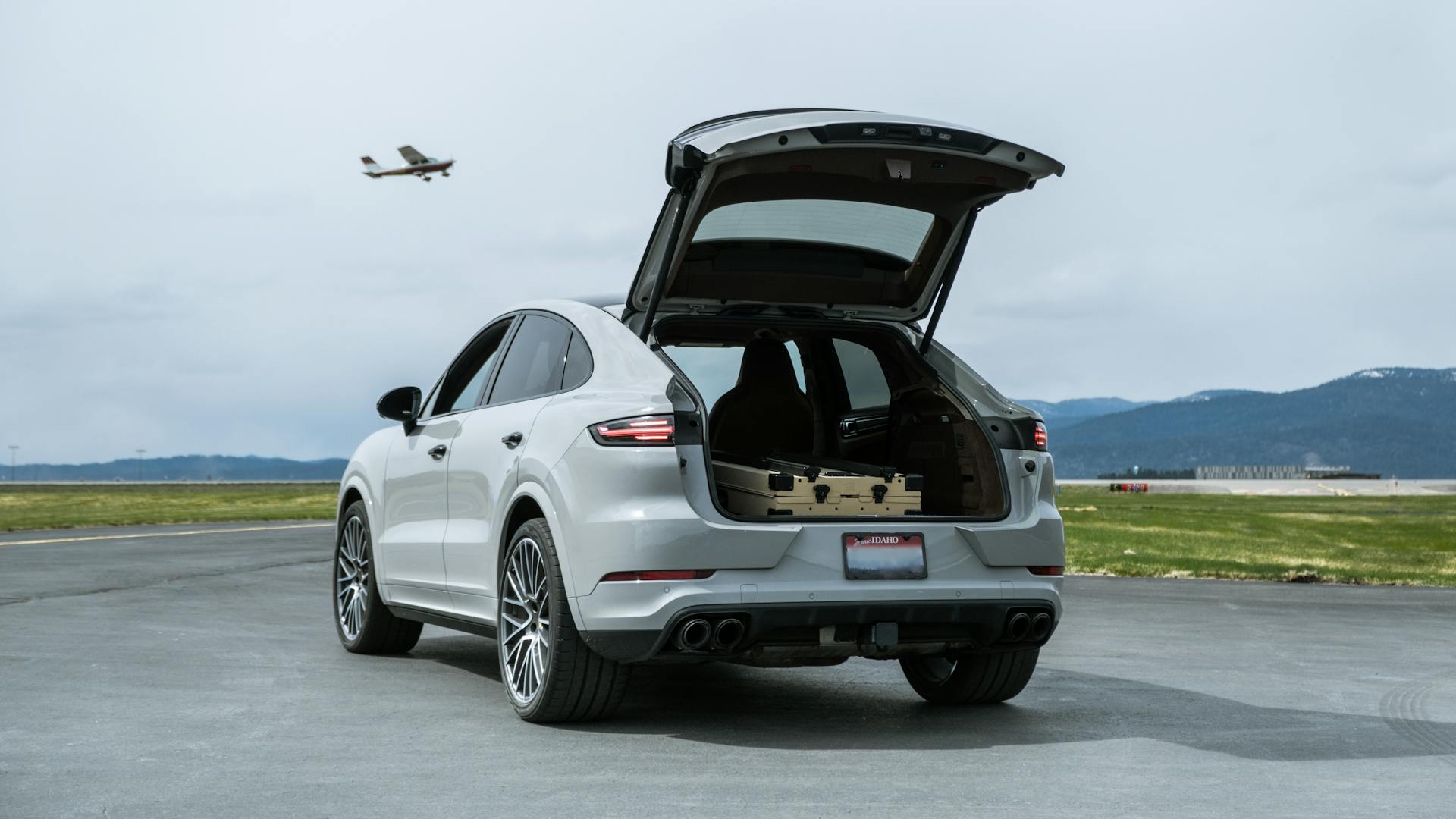 Travel in Style: Impact Collapsible Dog Crate Fits Perfectly in the Back of a Porsche Cayenne