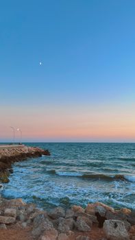 Beautiful sunset over the Mediterranean Sea with vibrant colors in Mersin, Türkiye.