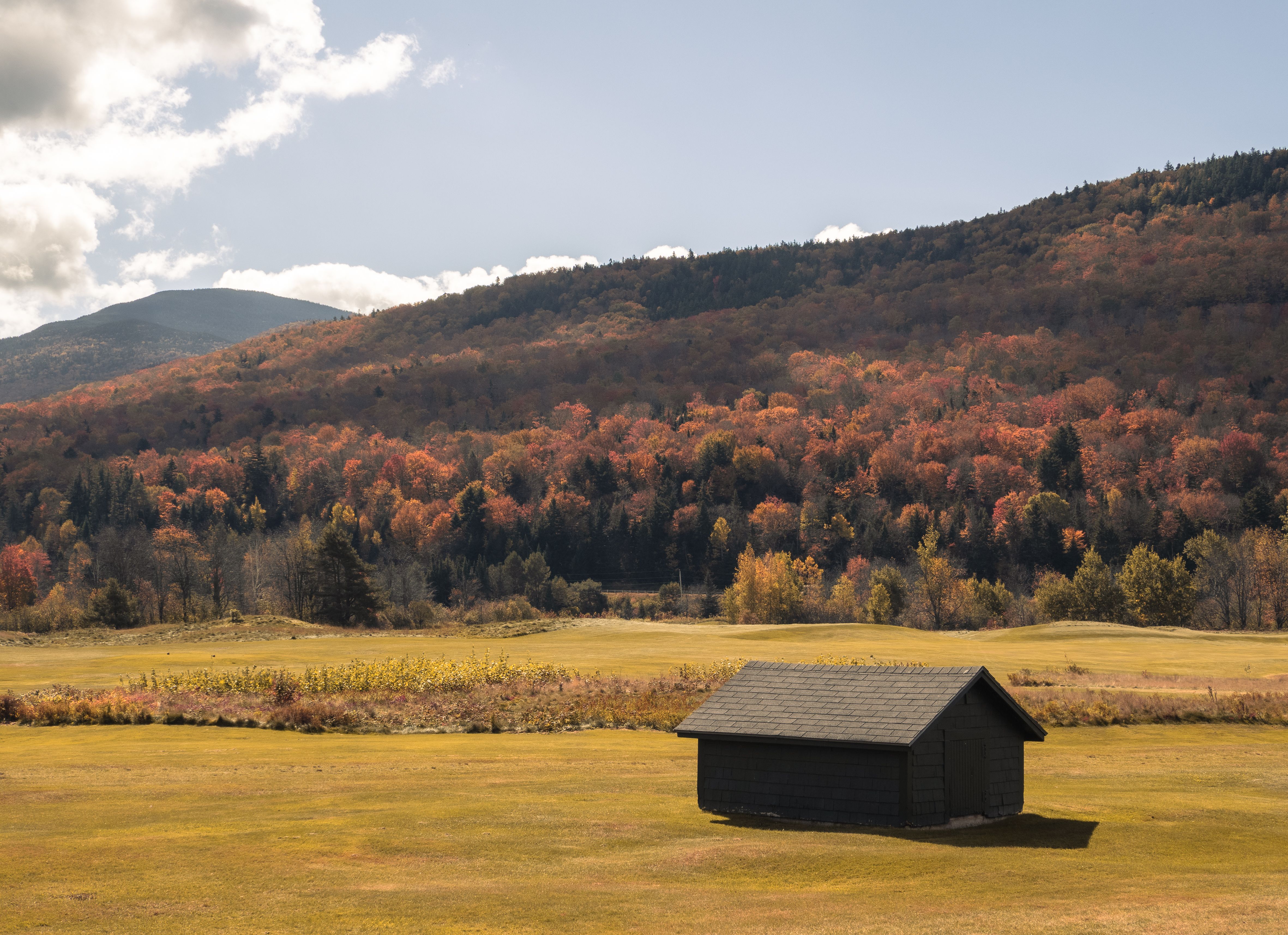 Idyllic Autumn Landscape with Rustic Cabin · Free Stock Photo