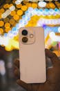 Smartphone with Bokeh Lights in Kolkata