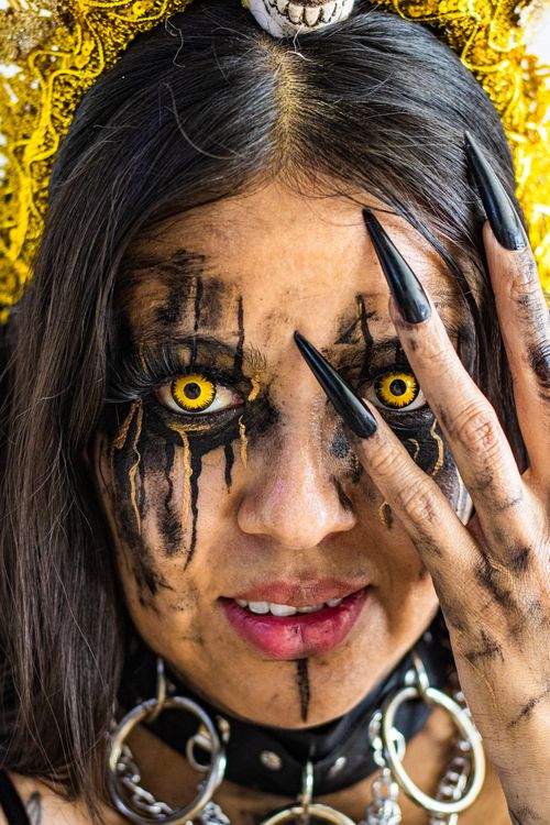 Free Close-up portrait featuring intricate horror makeup and yellow eyes. Stock Photo