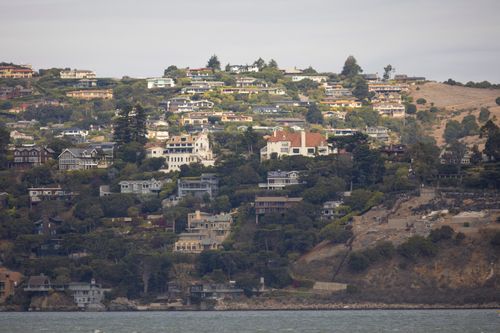 Free Picturesque hillside homes stacked over San Francisco Bay. Scenic and serene. Stock Photo