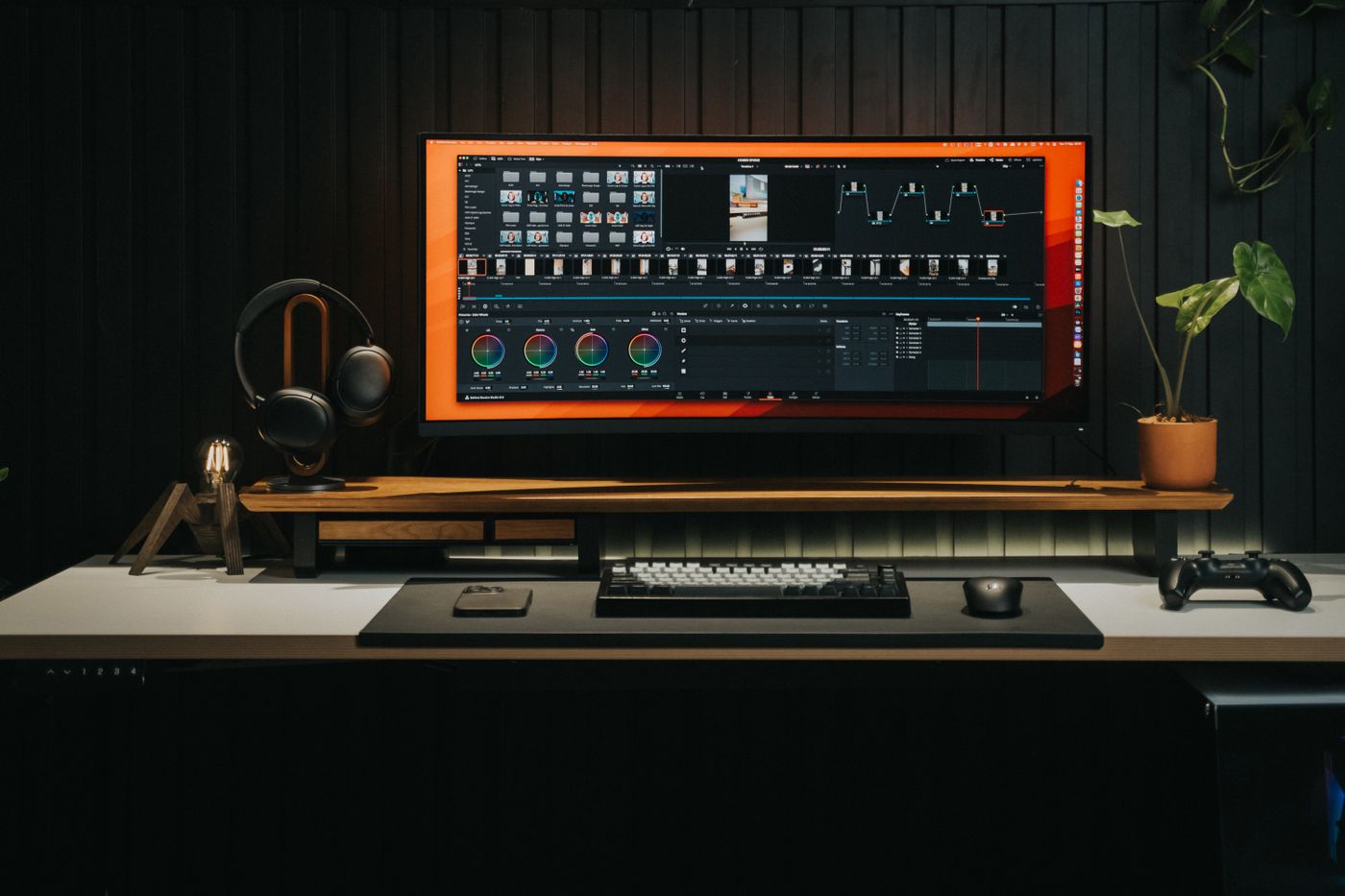 The Fennimore desk mat laid out on a dark studio desk — photo by Minh Phuc on Pexels