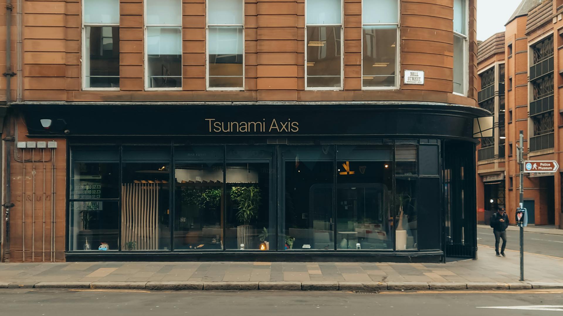 Elegant storefront of Tsunami Axis in urban setting, Bell Street.