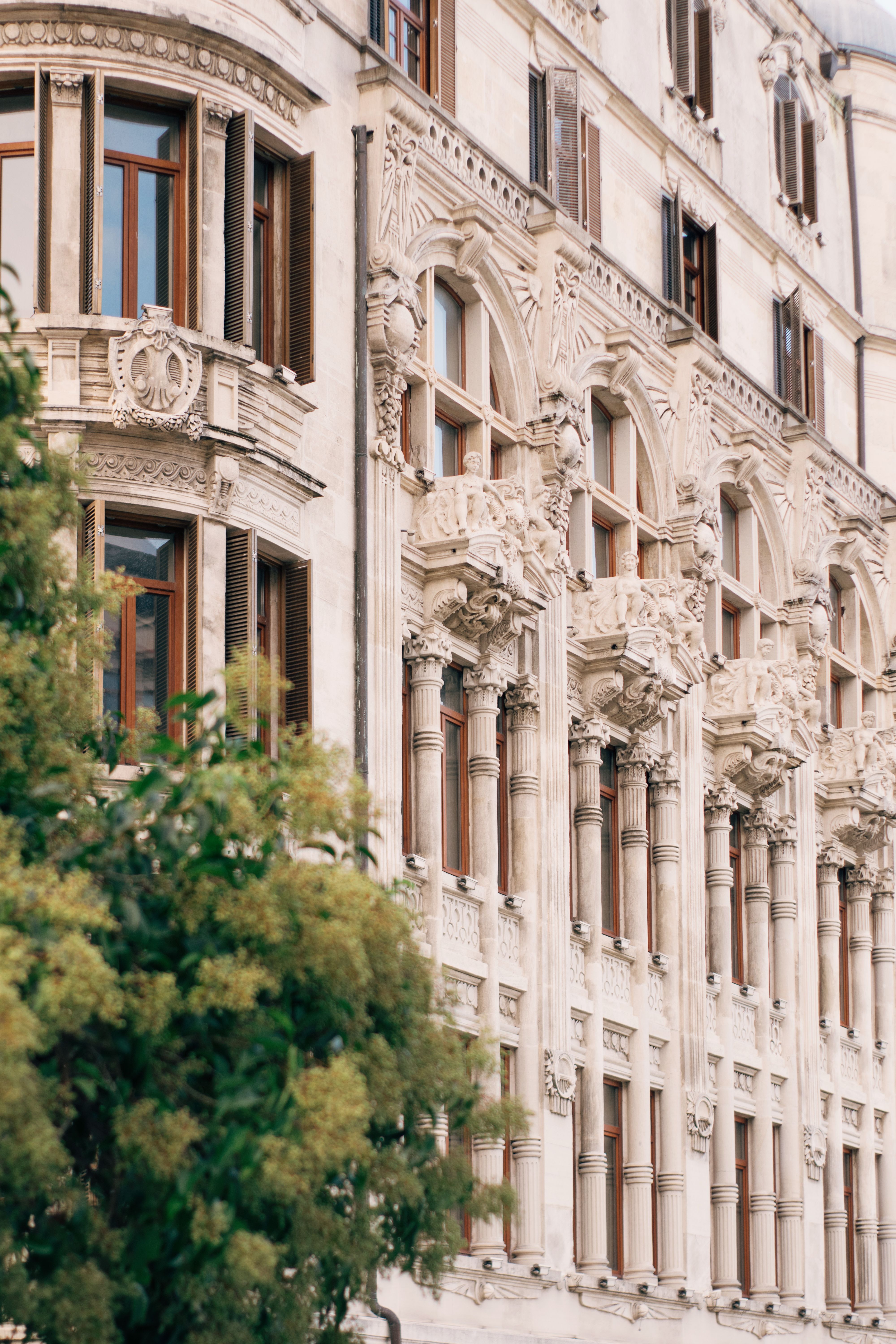 Classic European Architecture Facade with Ornate Details · Free Stock Photo
