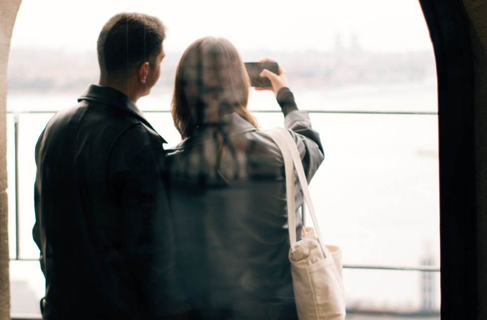couple using dating app on smartphone