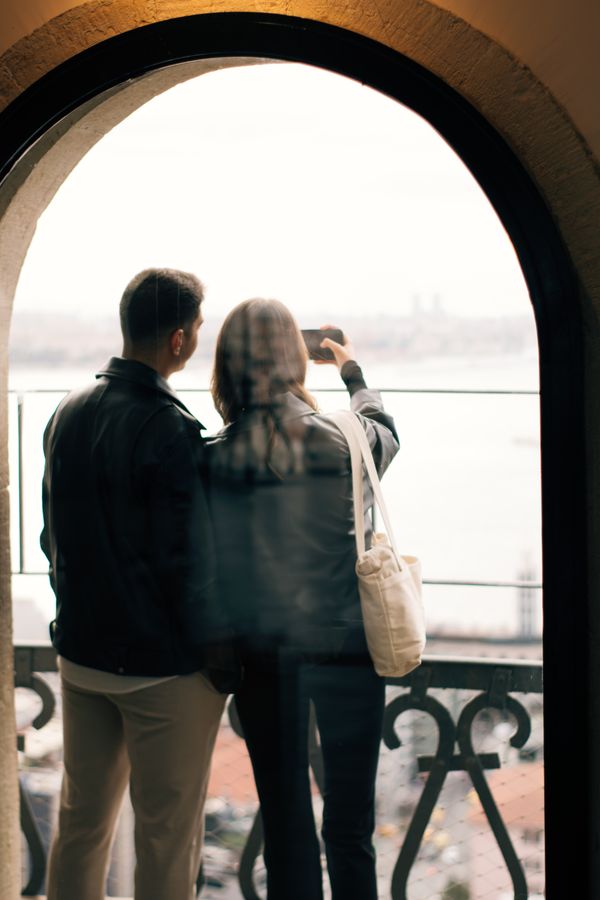 A couple over a city view
