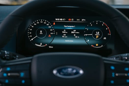 Interior car dashboard with digital display showing speed and trip computer information.