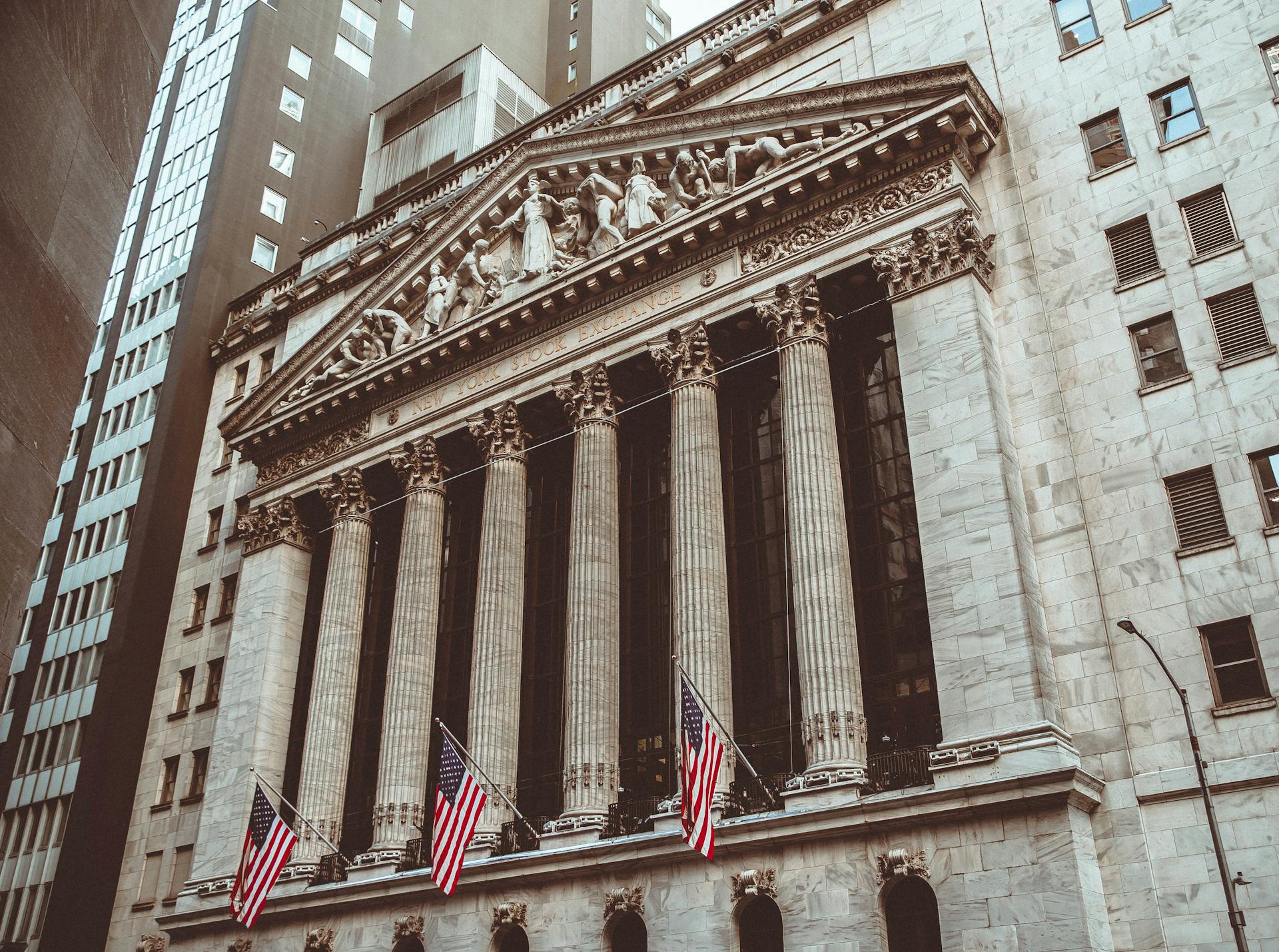 Historic New York Stock Exchange building facade captured in a vintage style.