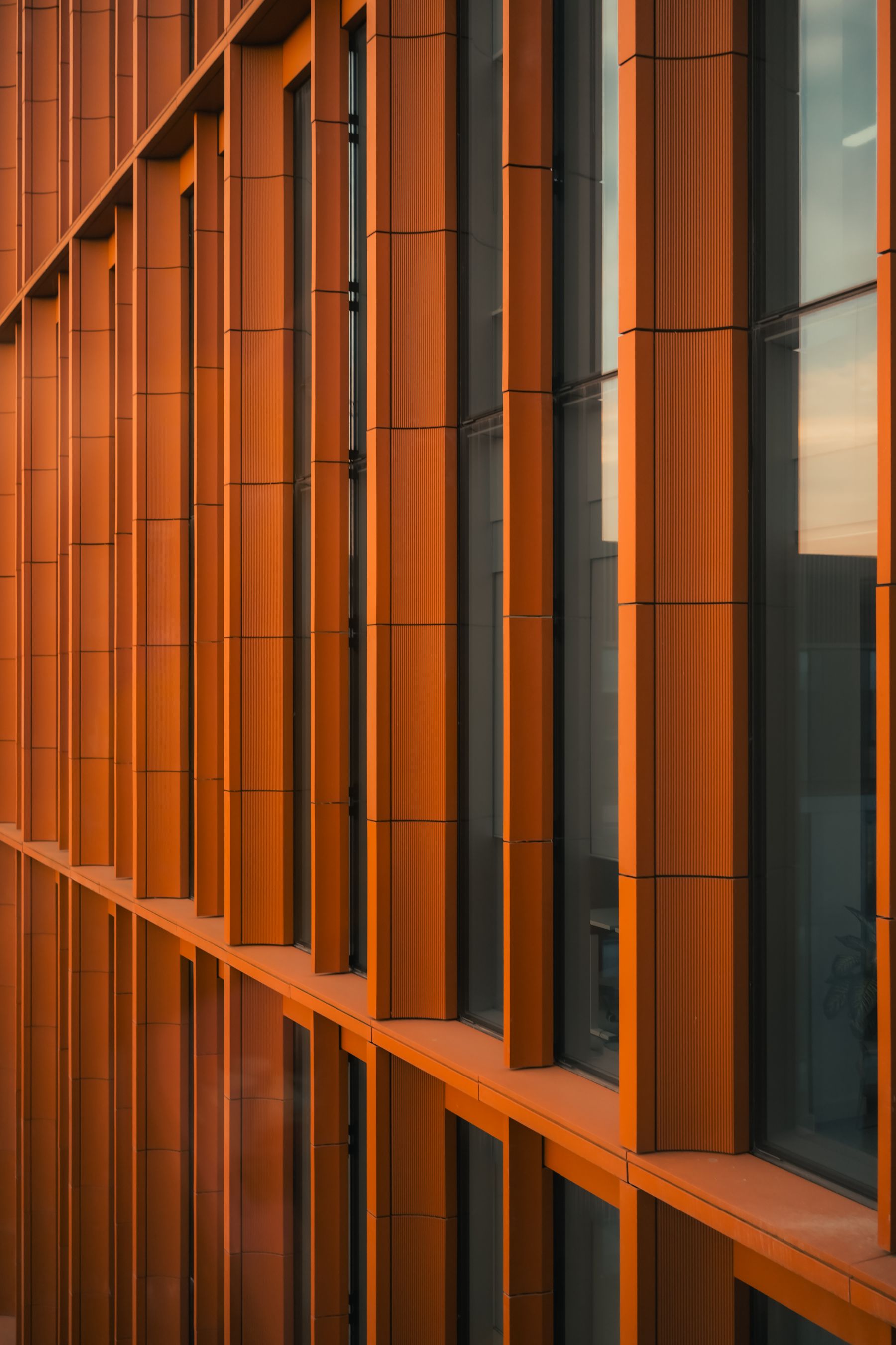 Contemporary orange building facade representing visual interruption