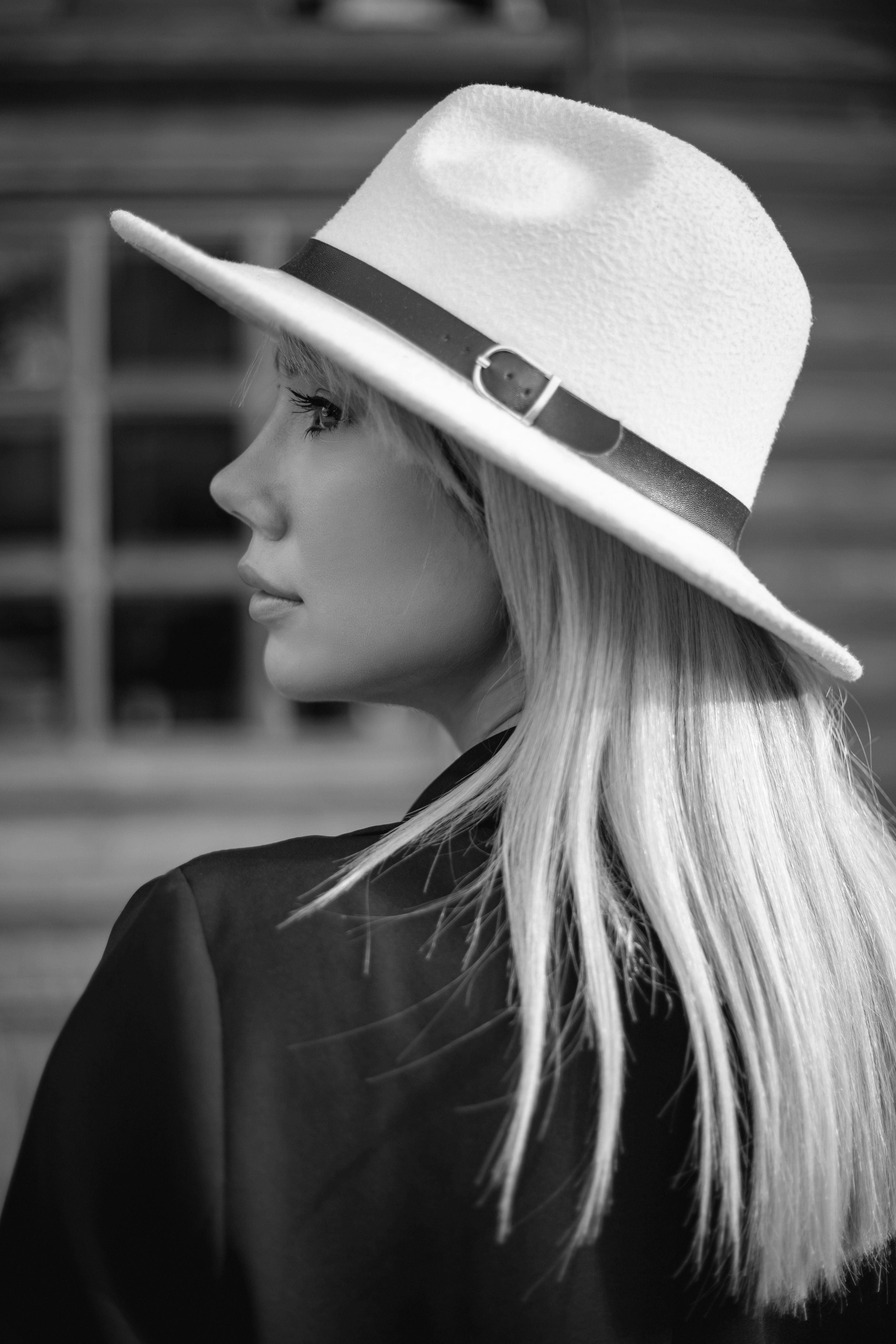 Elegant Black and White Portrait of Woman in Hat · Free Stock Photo