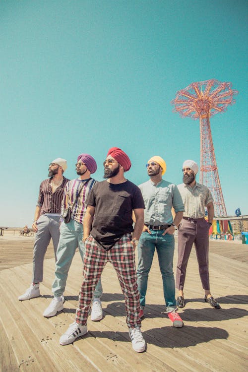 Five Men Wearing Assorted-color Turban Headdresses