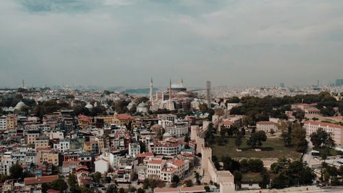 Free A stunning aerial shot of Istanbul's skyline highlighting the historic Hagia Sophia against a backdrop of the cityscape. Stock Photo