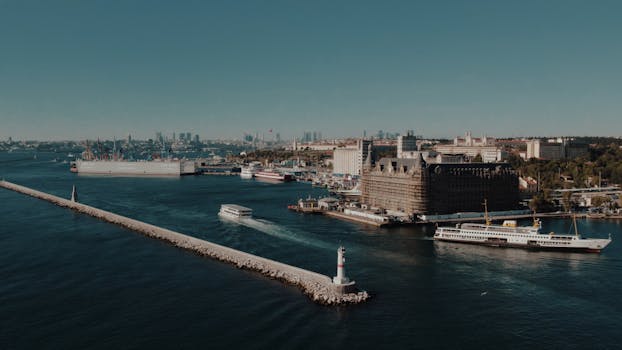 Aerial view of Haydarpaşa railway station and lighthouse in Istanbul, Türkiye.