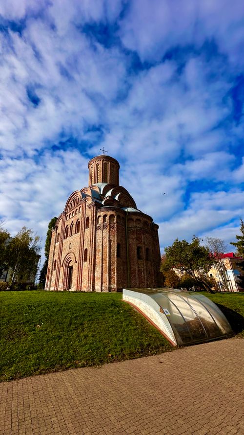 Free Beautiful historic brick church with a blue sky backdrop, captured outdoors. Stock Photo