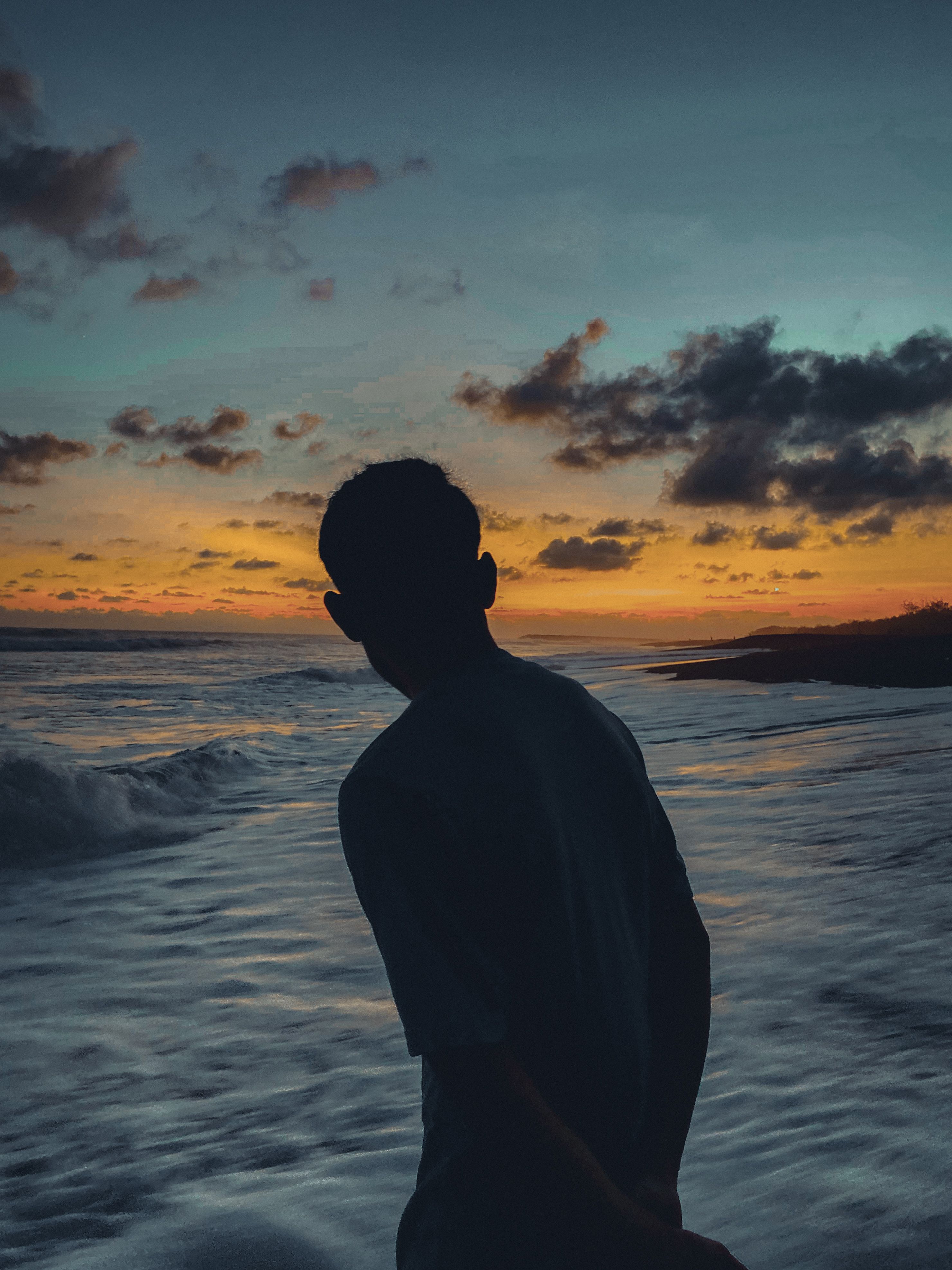 Silhouette of Person at Sunset Beach in Jogja · Free Stock Photo