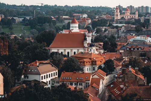 Free Charming aerial view of Vilnius old town with red-roofed buildings and historic architecture. Stock Photo