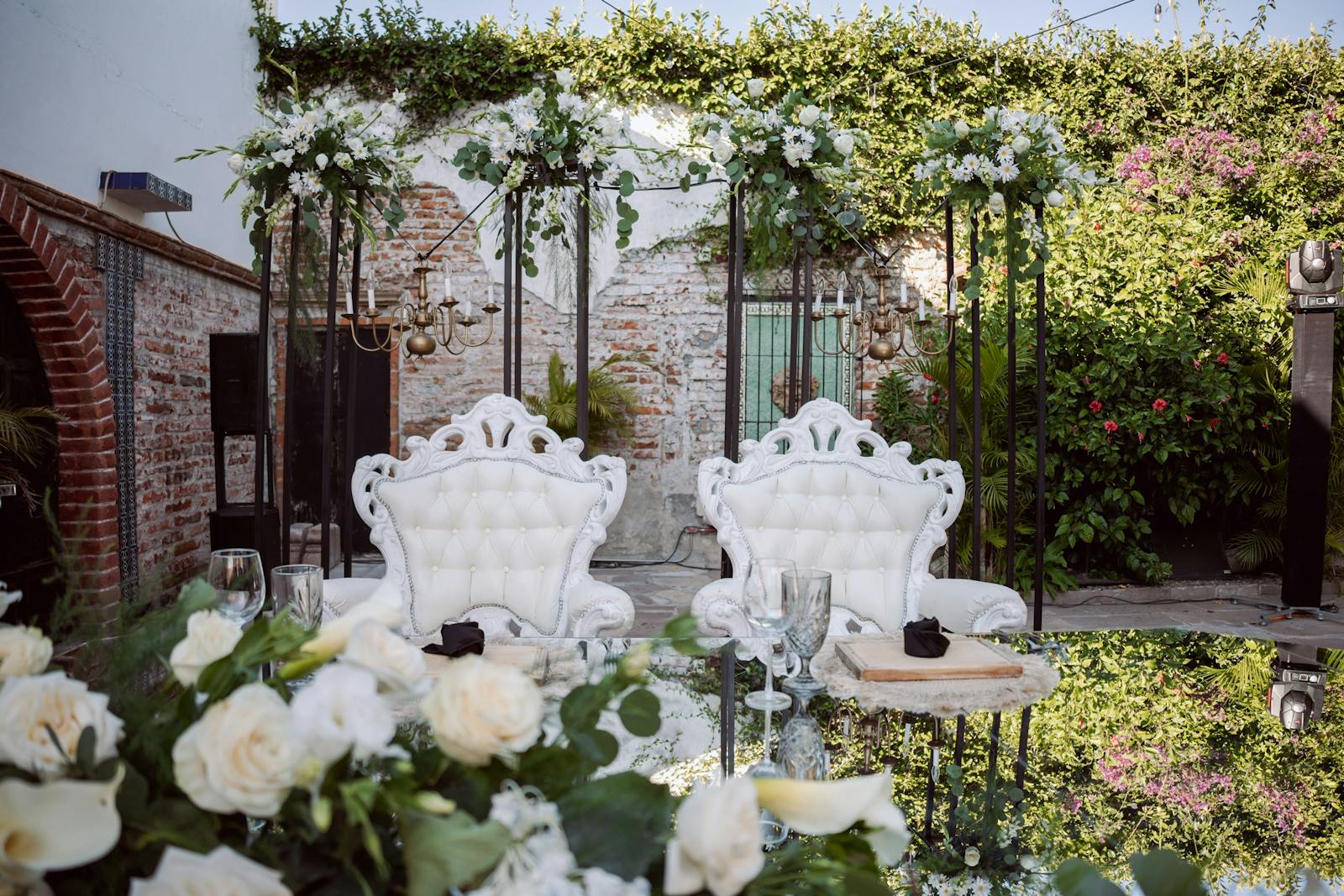 Elegant outdoor reception with florals and candles