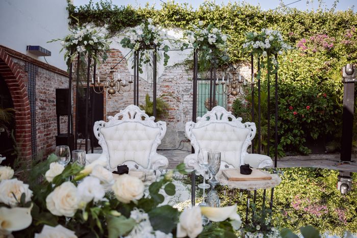 Outdoor setup with floral decor and rustic accents