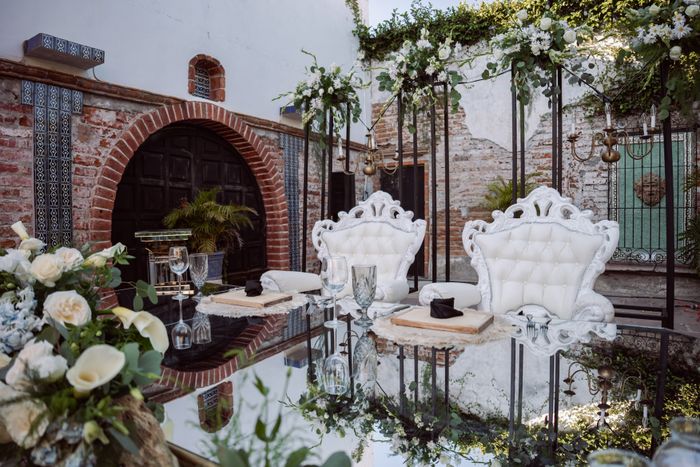 Elegant table setup with ornate chairs