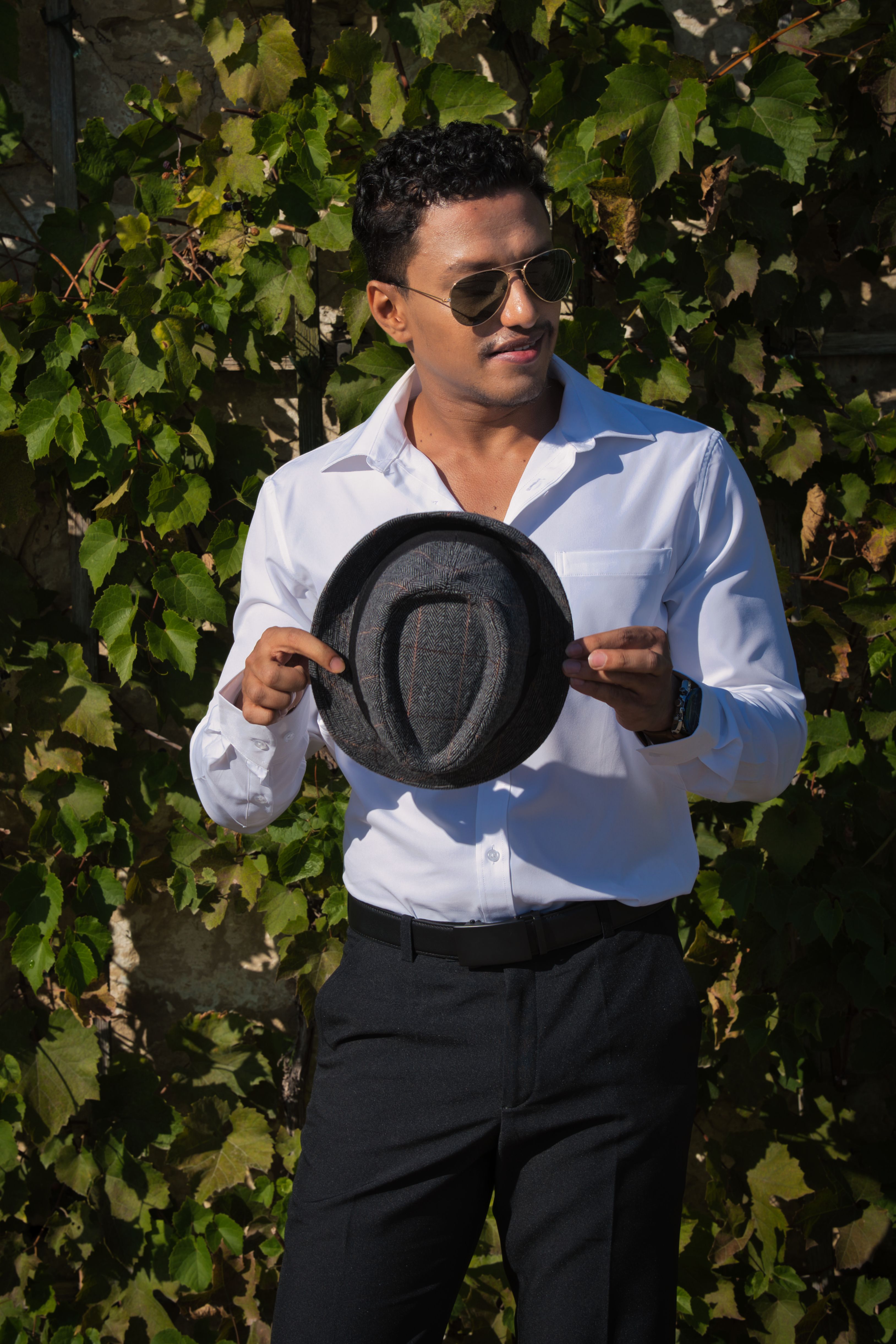 Stylish Man Posing Outdoors in Sanssouci Park · Free Stock Photo