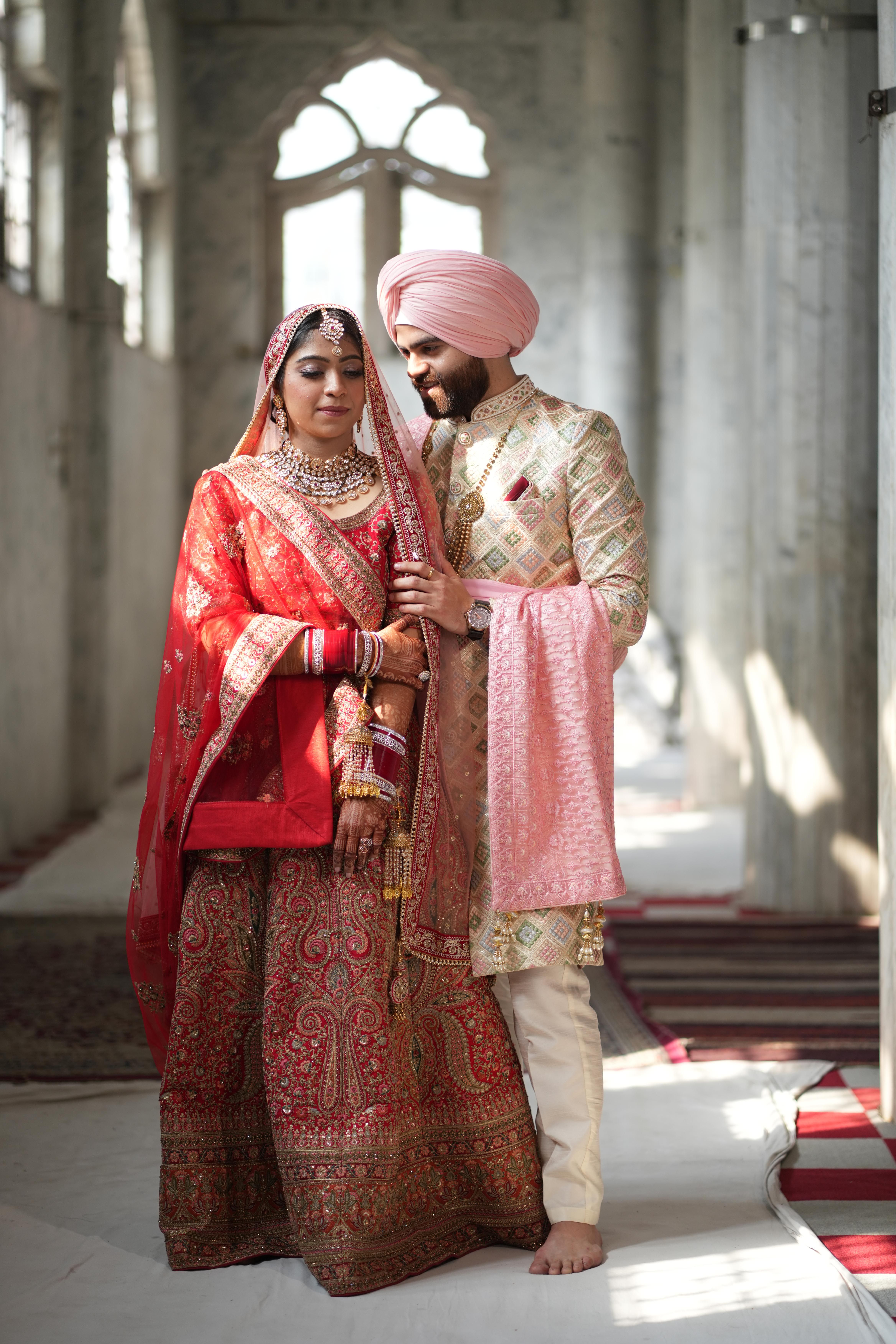 Elegant Indian Wedding Couple in Traditional Attire · Free Stock Photo