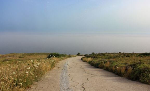 Scenic Coastal Road Leading to the Sea