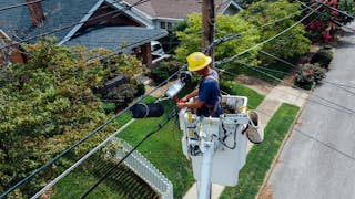 Photography of Man Repairing Electrical Wires