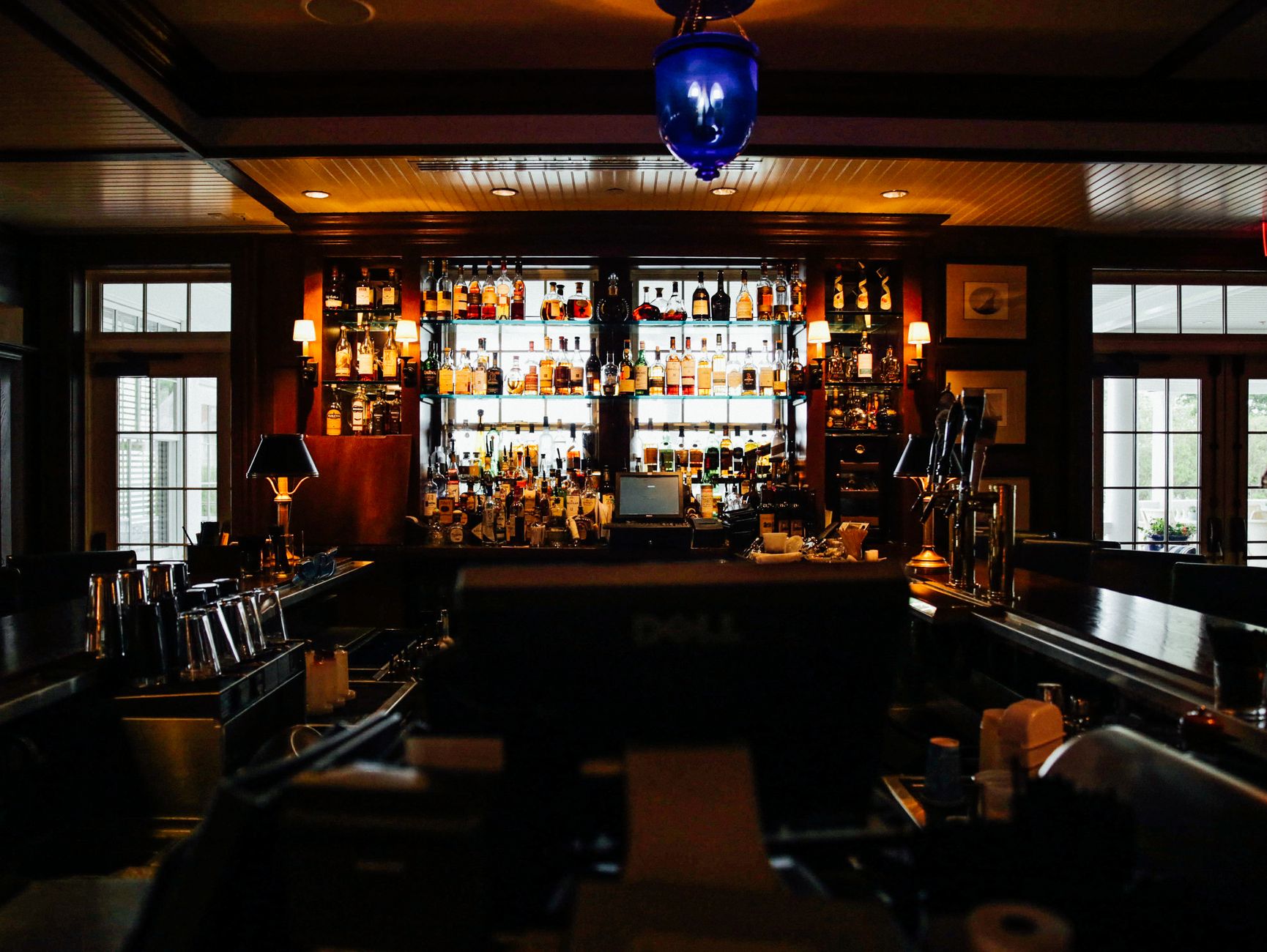 Historic pub interior with wood bar and dim lighting in downtown Albany