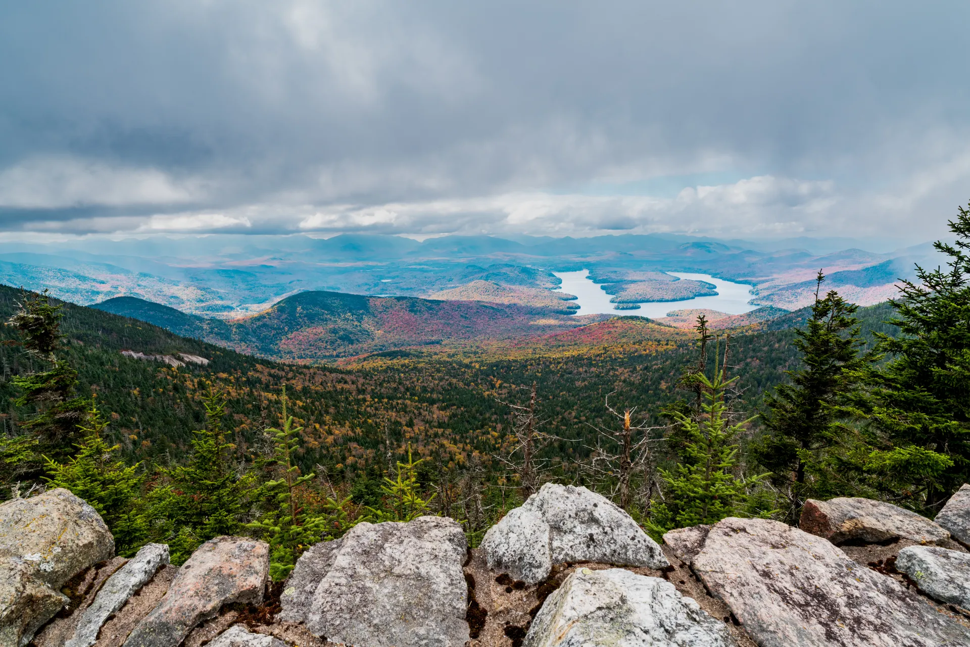 Breathtaking view of Adirondack Mountains and Lake Placid from Whiteface Mountain summit in fall.