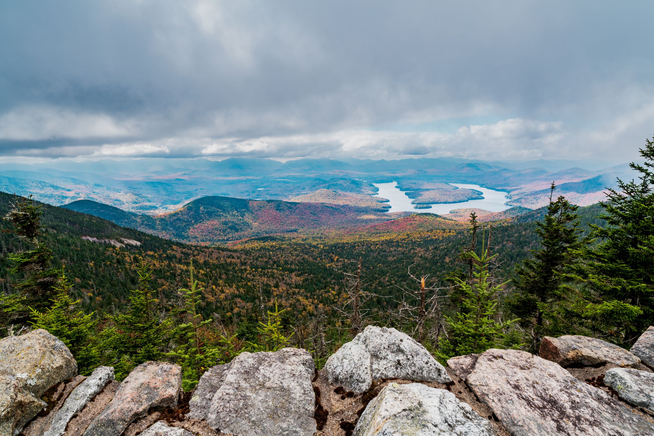 Breathtaking view of Adirondack Mountains and Lake Placid from Whiteface Mountain summit in fall.