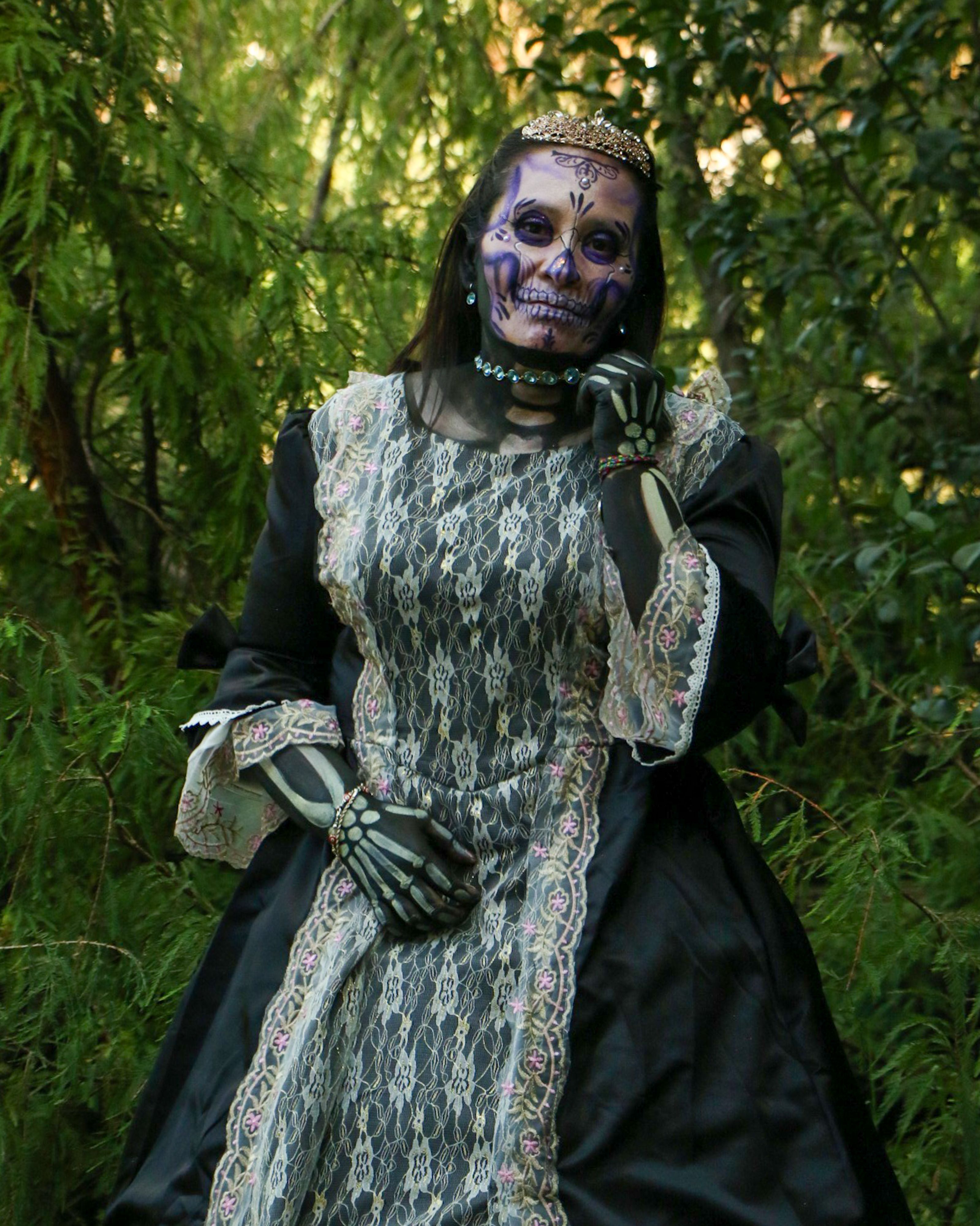 Gothic Woman in Lace Dress with Skull Makeup  Free Stock Photo